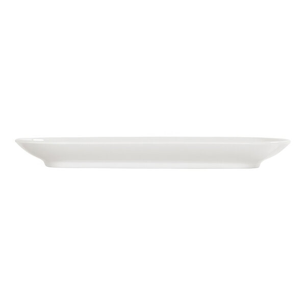 A white rectangular plate with a raised rim on a white surface.