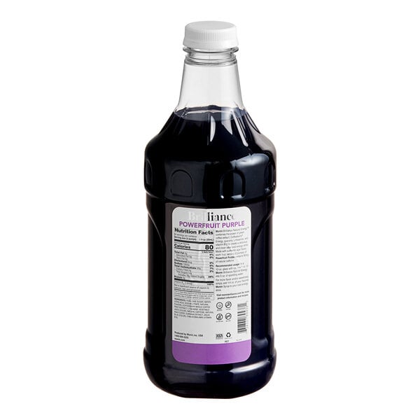 A Monin bottle of purple liquid.