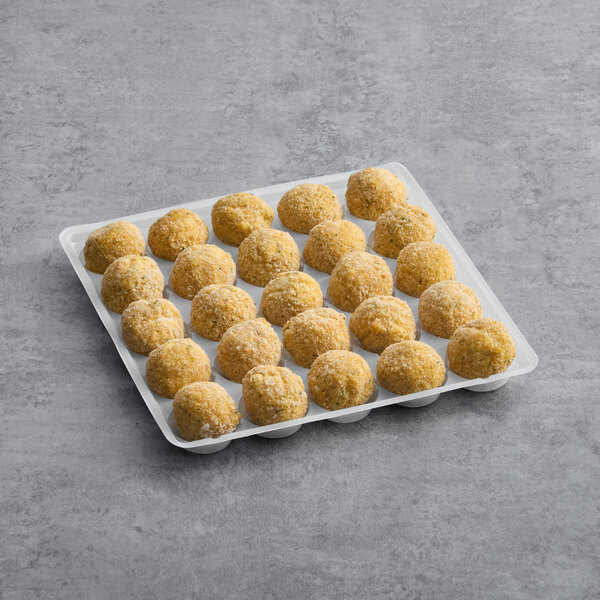 A tray of Simply Cuisine Italian Burrata Bites on a gray surface.