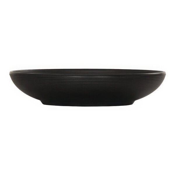 A close up of a black Cal-Mil melamine bowl.