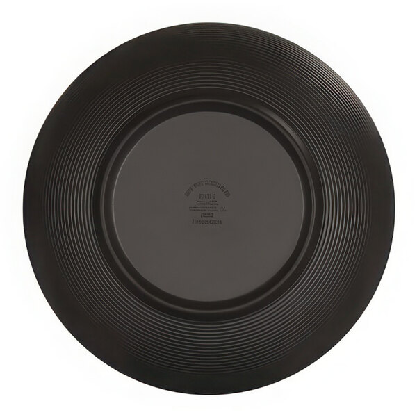 A black Cal-Mil melamine bowl with a circular pattern on the inside.