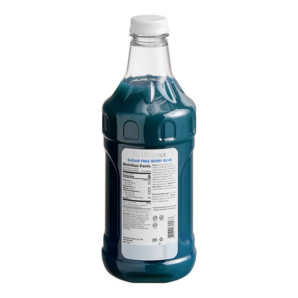 A blue bottle of Monin Brilliance Sugar-Free Berry Blue Energy Concentrate with a label.