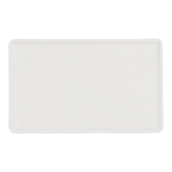 A white rectangular Cal-Mil melamine platter with a raised rim.