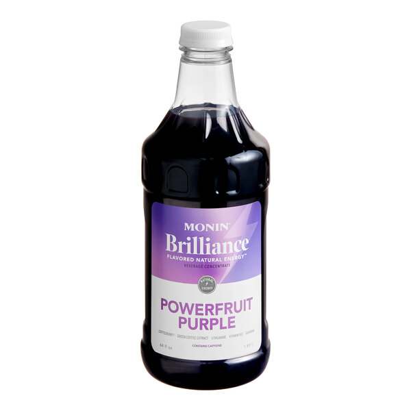 A bottle of Monin Brilliance Powerfruit Purple Energy Concentrate.