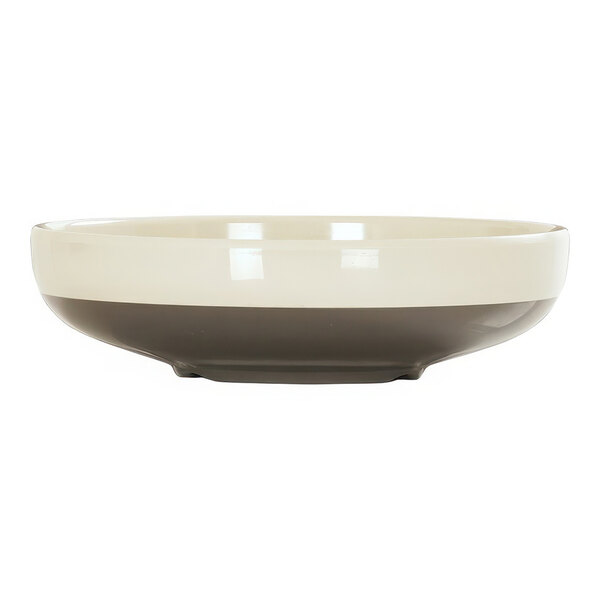 A Cal-Mil Vienna melamine bowl with a white and brown rim.