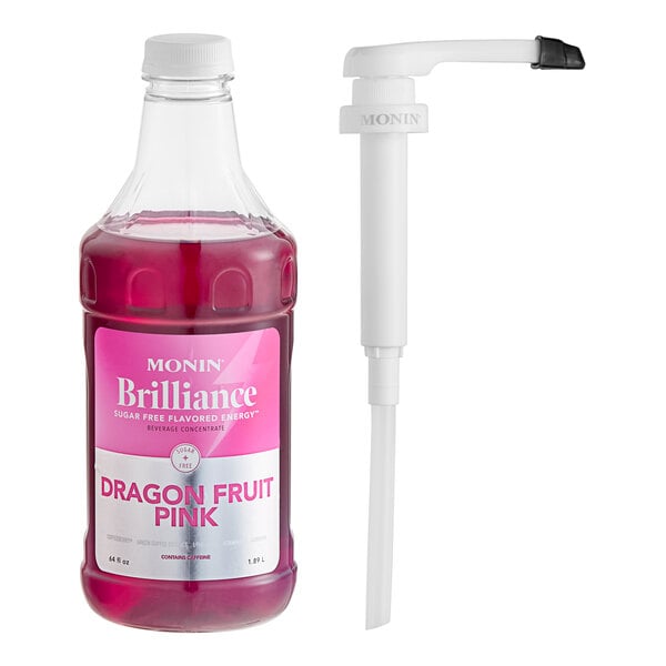 A plastic bottle of Monin Brilliance Sugar-Free Dragon Fruit Pink Natural Energy Concentrate with a white cap filled with pink liquid.