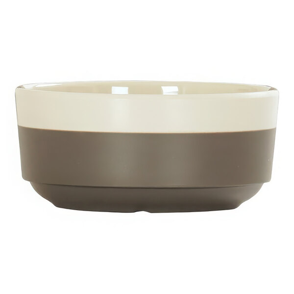A Cal-Mil Vienna melamine bowl with a brown and cream rim.