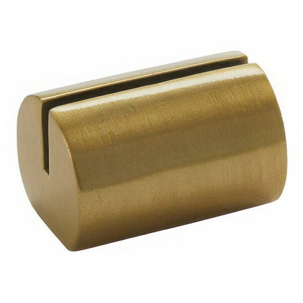 An American Metalcraft gold cast aluminum cylinder with a hole in it and a brass knob.