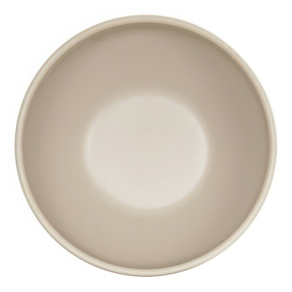 A taupe Cal-Mil melamine soup bowl with a white circle on it.