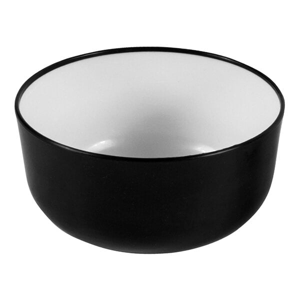 A Solia black and white plastic bowl with a white rim.