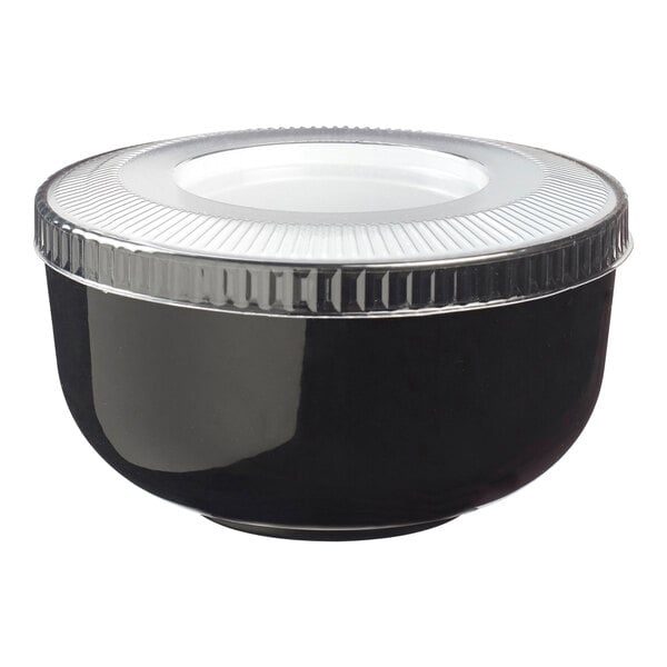 A black bowl with a clear plastic lid with a silver rim.