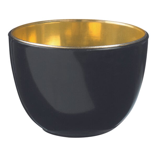 A Solia black and gold plastic tulip bowl with a gold rim.