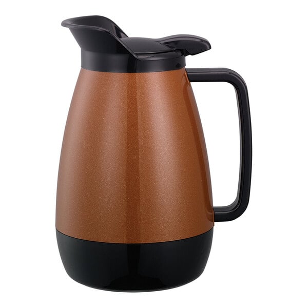 A copper and black Thermo-Serv coffee carafe with a brown lid.