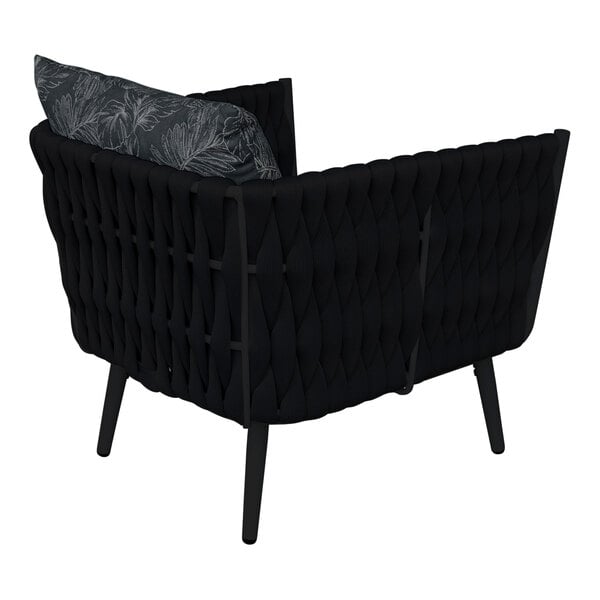 A BFM Seating black rope outdoor armchair with a black cushion and back pillow.