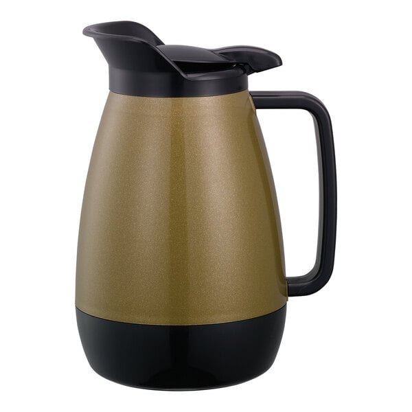 A black and gold coffee pot with a black handle.