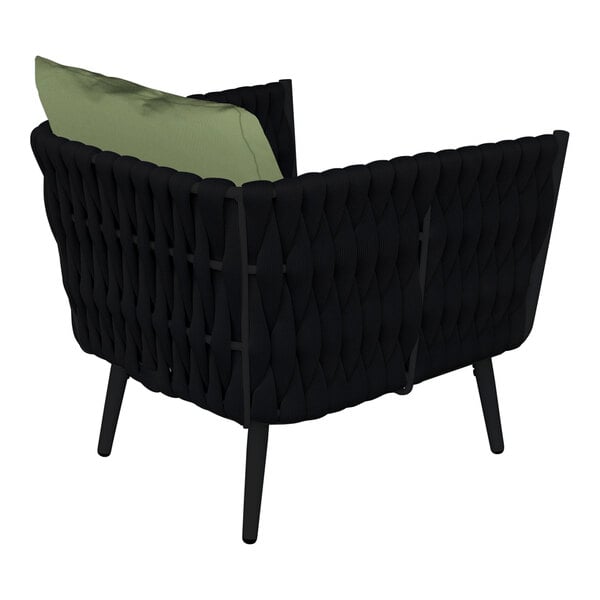 A black wicker BFM Seating outdoor armchair with green Sunbrella cushions and back pillow.