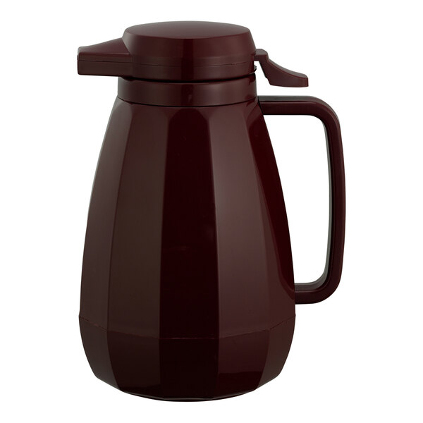 A brown plastic Service Ideas coffee carafe with a lid and handle.