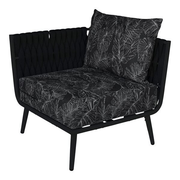 A black BFM Seating Cayman outdoor couch corner section with a black Sunbrella cushion and a black pillow.