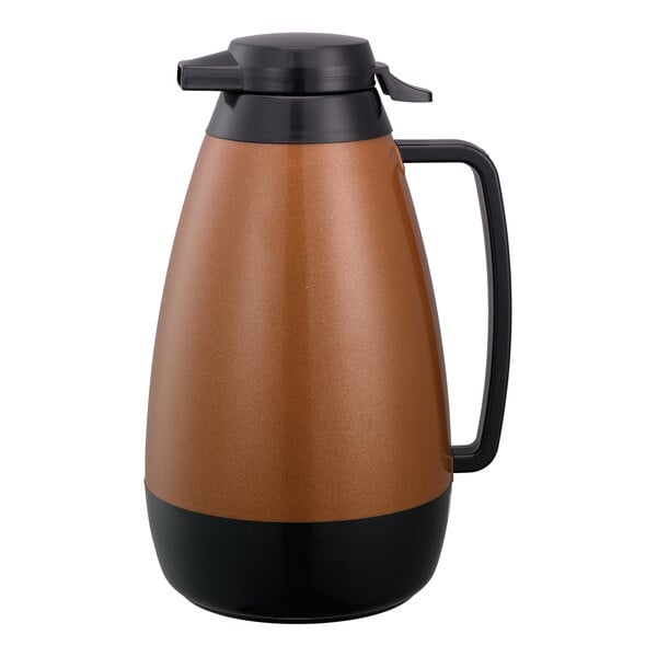 A brown and black Service Ideas Thermo-Serv coffee carafe with a push-button lid.