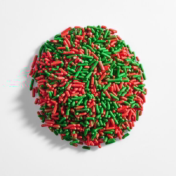 A round pile of red and green holiday sprinkles.