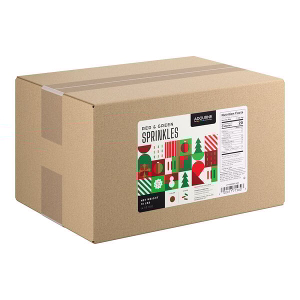 A large cardboard box labeled as containing 10 pounds of Adourne red and green holiday sprinkles.