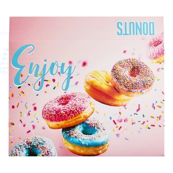 A Southern Champion multicolor donut box with pink and blue donuts and yellow sprinkles.