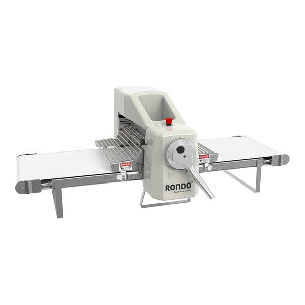 A white and silver Rondo Countertop Dough Sheeter with a handle.