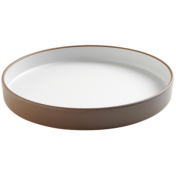 A white and brown Cal-Mil stoneware raised rim melamine plate.