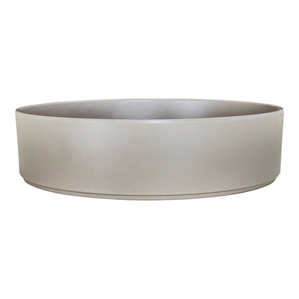 A white Cal-Mil ramekin with a silver rim.