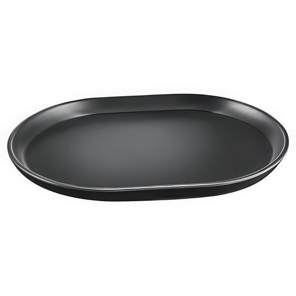 A black oval shaped Cal-Mil melamine platter with a raised rim.