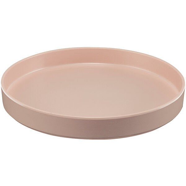 A round pink Cal-Mil Hudson melamine plate with a raised rim.