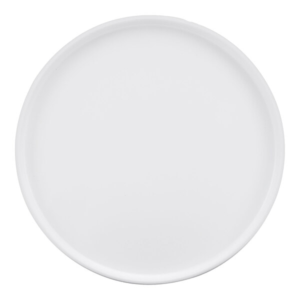 A white Cal-Mil melamine plate with a round rim.