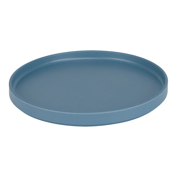 A blue round plastic plate with a low rim.