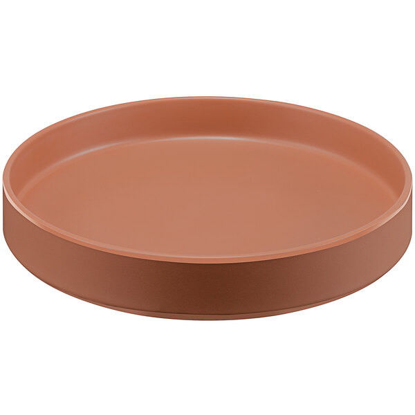 A brown round Cal-Mil Terra Cotta melamine plate with a raised rim.