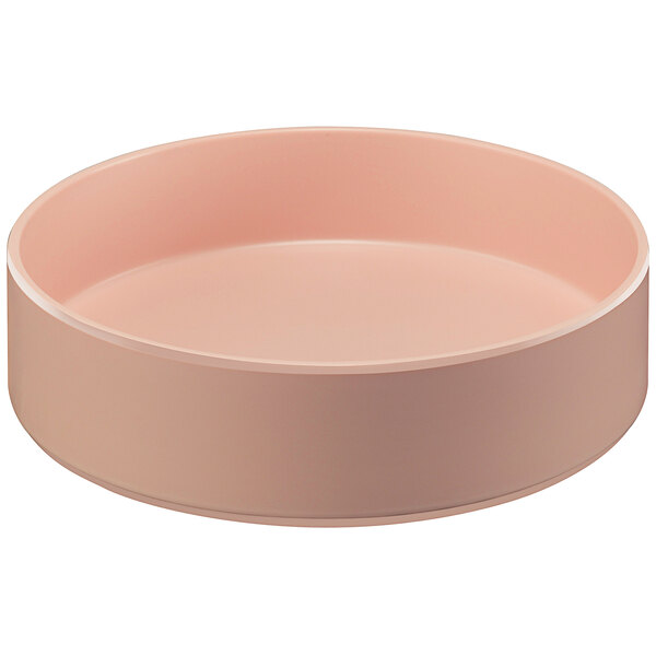 A pink Cal-Mil melamine bowl with a raised rim.
