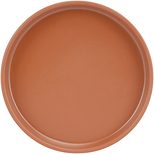 A brown Cal-Mil melamine plate with a low rim.
