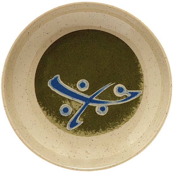 A close-up of a GET Japanese Traditional sauce dish with a blue design.