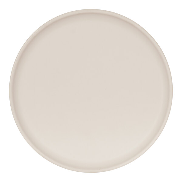 A Cal-Mil Sophie ivory melamine plate with a round rim.