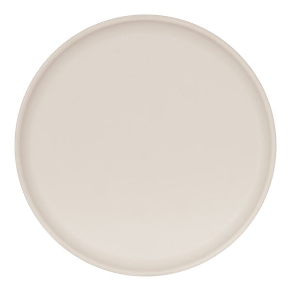 A Cal-Mil Sophie ivory melamine plate with a round two-tone rim.