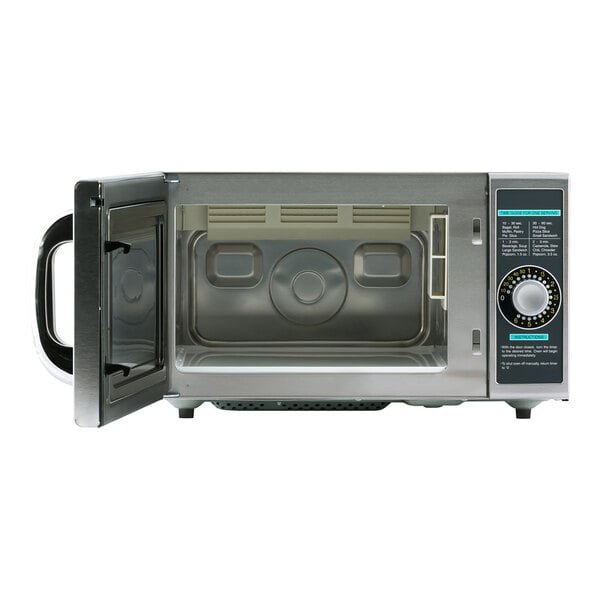 The open door of a Sharp stainless steel commercial microwave.