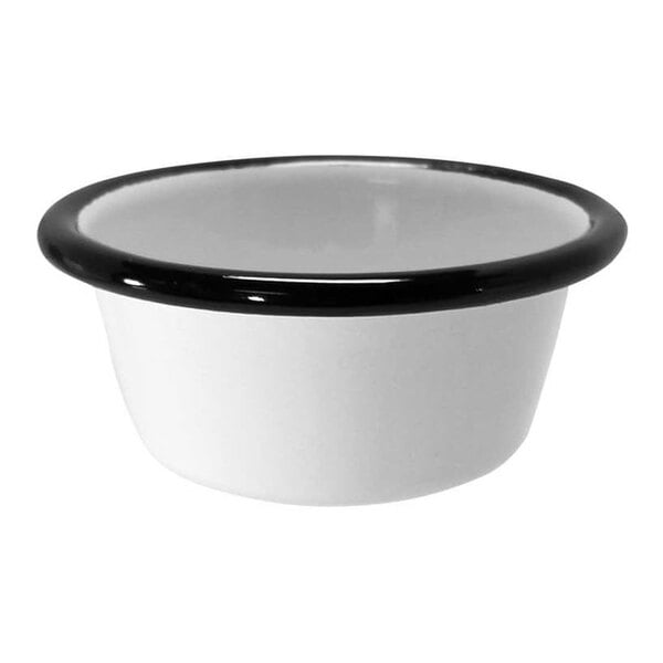 A white porcelain ramekin with a black rim.