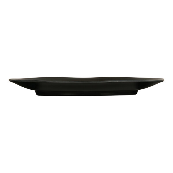 A black Cal-Mil melamine platter with an oval surface.