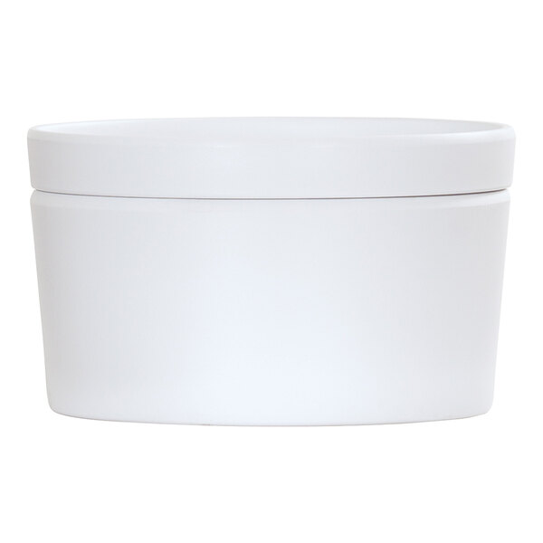A white Cal-Mil round melamine bento box with a lid.