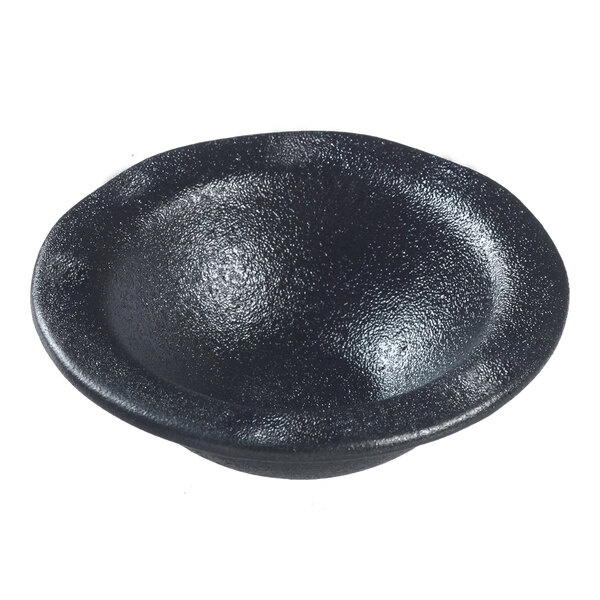 A black round Solia porcelain mini dish.
