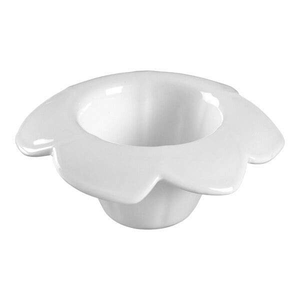 A white flower shaped bowl with a flared rim.