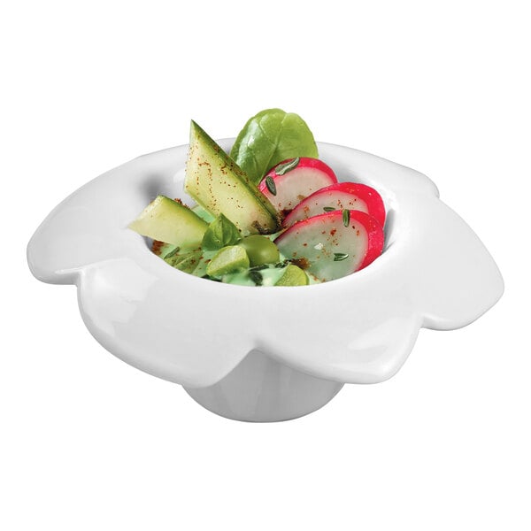 A white Solia porcelain mini dish with vegetables in it.