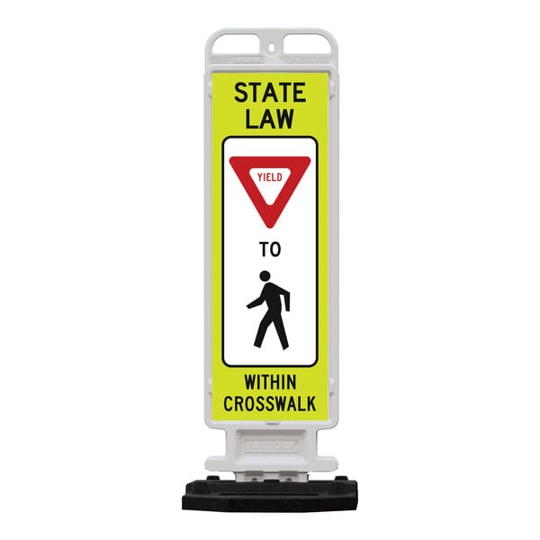 a yellow and white sign with a black base