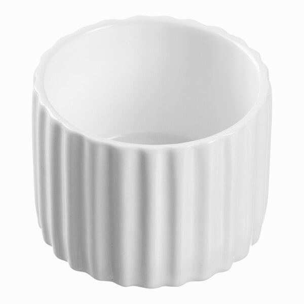 A Solia white fluted porcelain mini dish with a ribbed design.