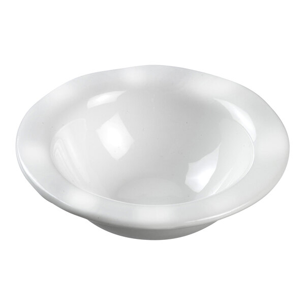 A close-up of a white Solia porcelain mini dish with a white rim.