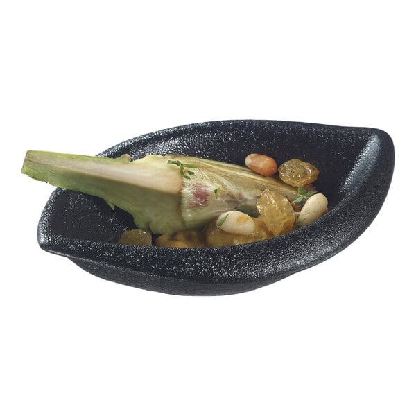 A black Solia porcelain mini dish filled with food.
